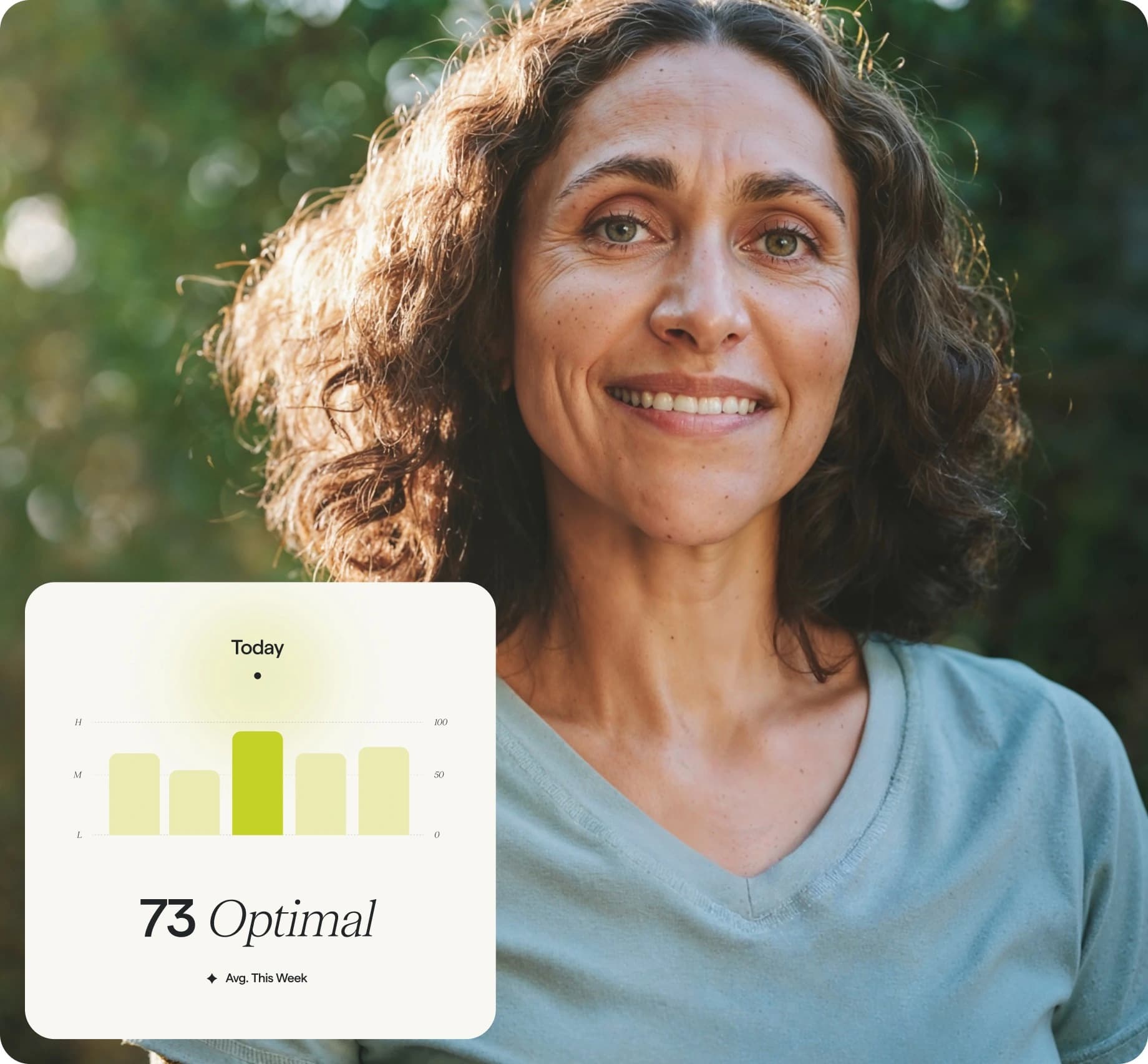 Person in a teal shirt displaying a health tracking app screen with the score "73 Optimal".