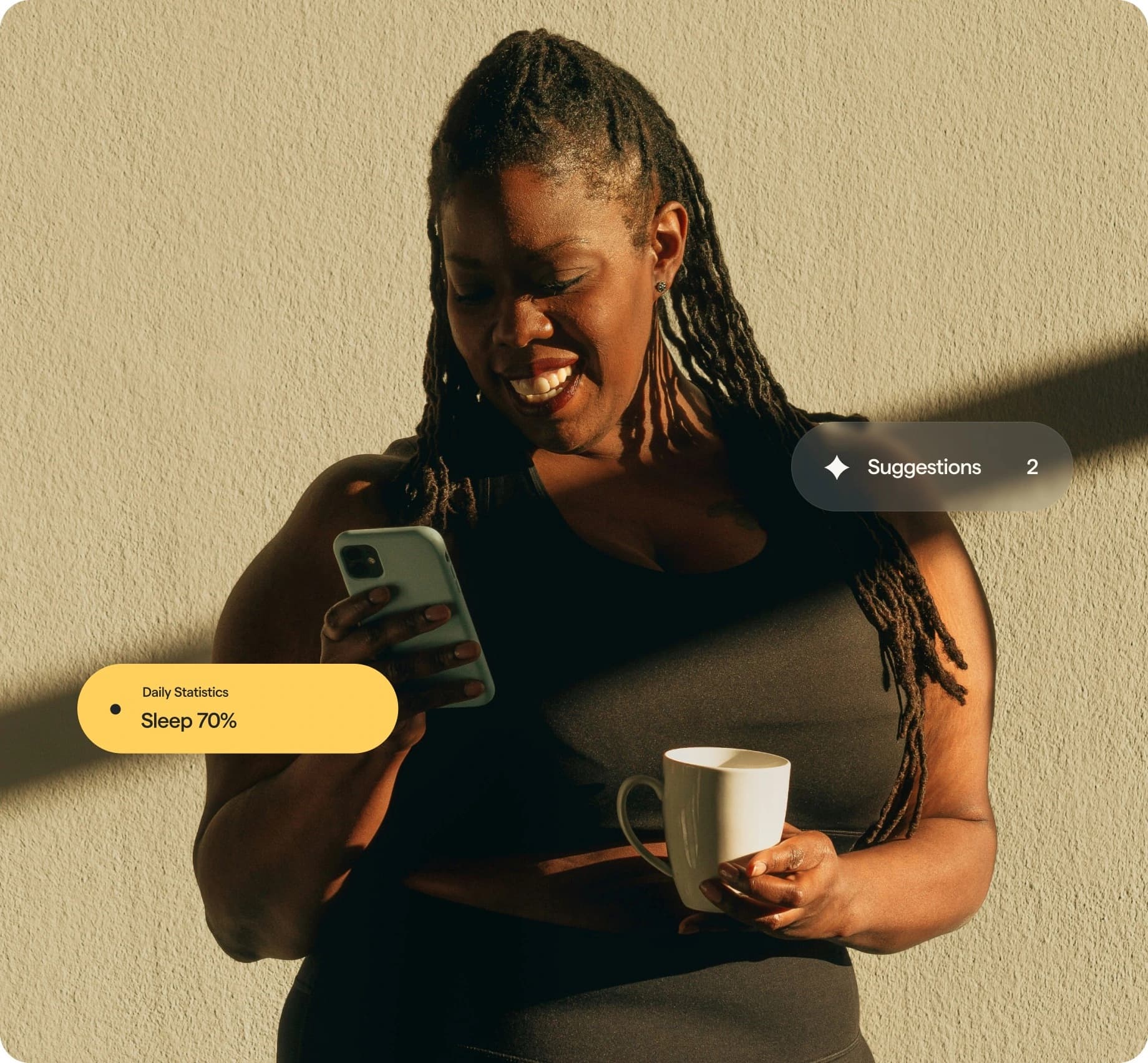 Person holding a phone and a coffee cup with on-screen sleep statistics.